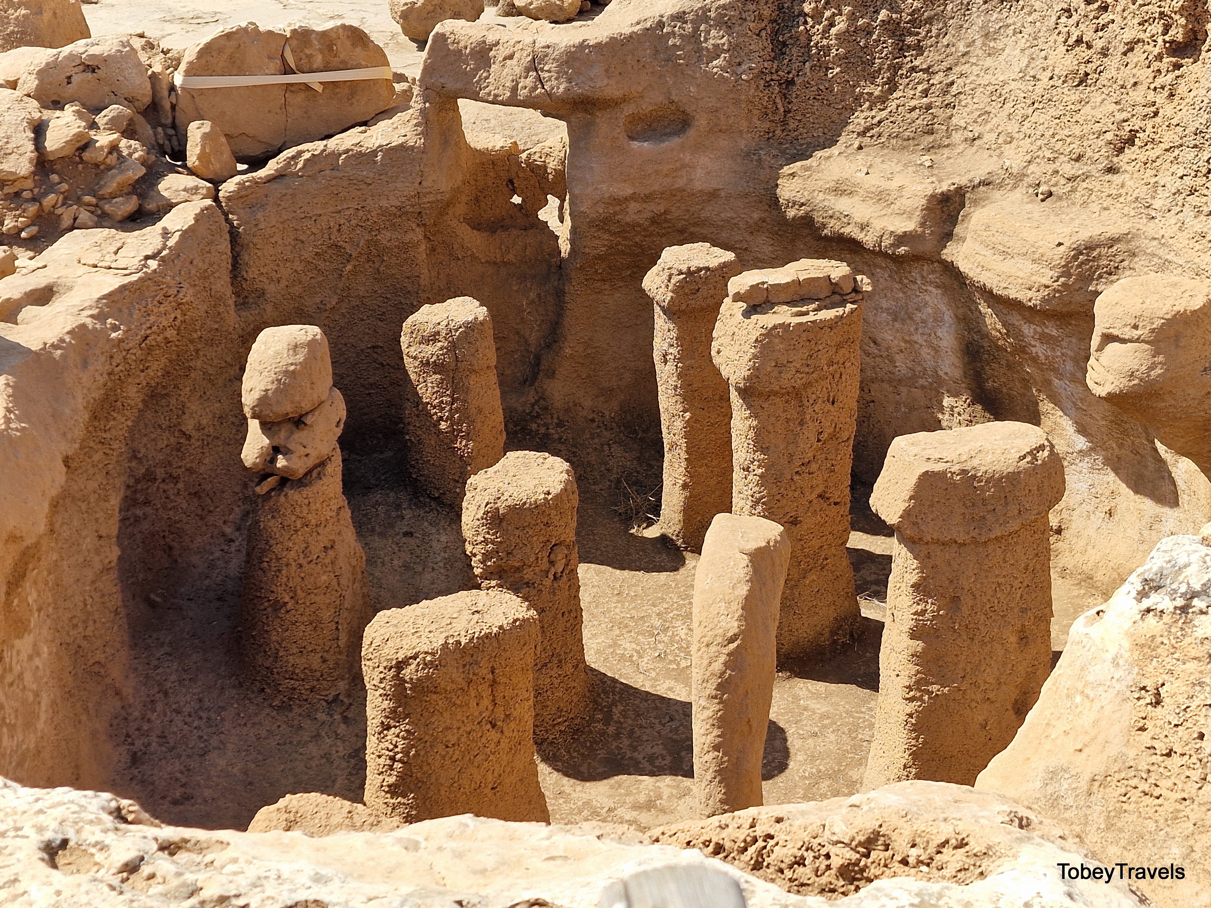 Karahan Tepe T-pillars and carved head, Turkey